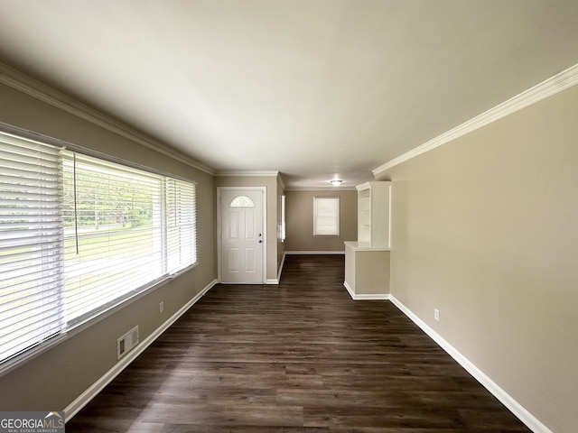 2165 Pemberton Rd, Atlanta, GA 30331 - unfurnished living room featuring baseboards, ornamental molding, and dark wood-style floors