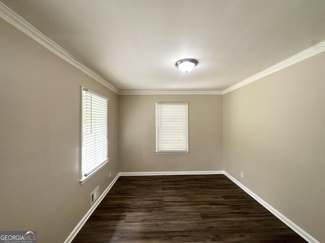2165 Pemberton Rd, Atlanta, GA 30331 - empty room with ornamental molding, dark wood-type flooring, and baseboards