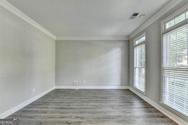 2049 Mclain Rd NW, Acworth, GA 30101 - empty room with crown molding, wood finished floors, and baseboards