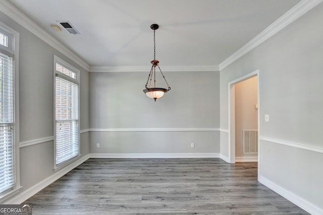 2049 Mclain Rd NW, Acworth, GA 30101 - spare room with crown molding, plenty of natural light, wood finished floors, and baseboards