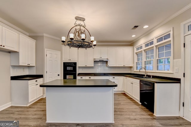 2049 Mclain Rd NW, Acworth, GA 30101 - kitchen featuring black appliances, dark countertops, a sink, white cabinetry, and crown molding