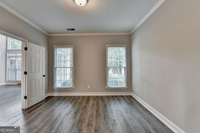 2049 Mclain Rd NW, Acworth, GA 30101 - spare room featuring dark wood-type flooring, healthy amount of natural light, baseboards, and ornamental molding