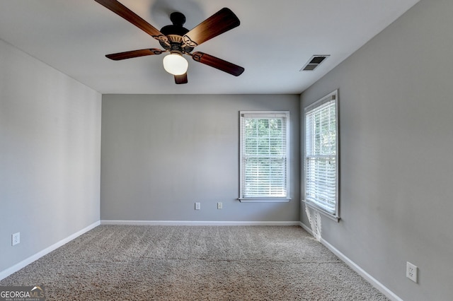 2049 Mclain Rd NW, Acworth, GA 30101 - carpeted spare room featuring baseboards and ceiling fan