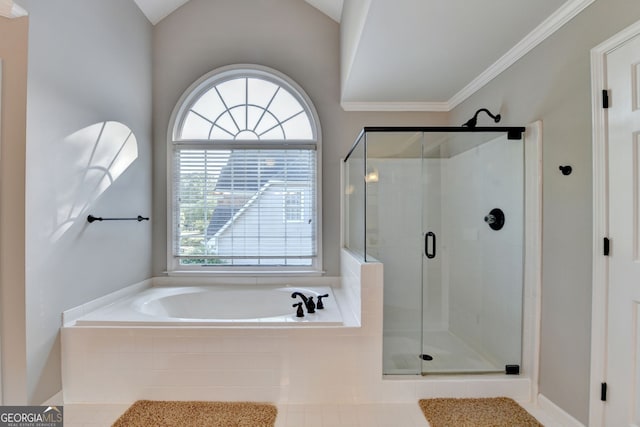 2049 Mclain Rd NW, Acworth, GA 30101 - full bathroom with a shower stall, a bath, ornamental molding, and lofted ceiling