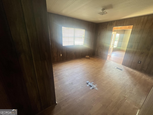 491 Cavender Creek Rd, Carrollton, GA 30116 - empty room with wood finished floors and wooden walls