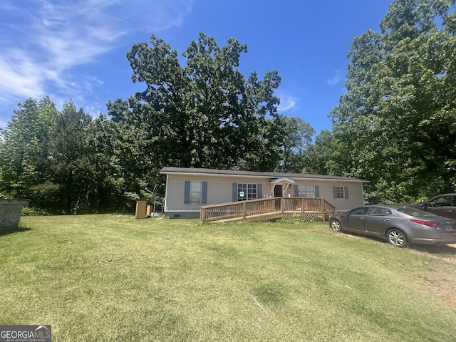 491 Cavender Creek Rd, Carrollton, GA 30116 - view of front of home featuring a deck, crawl space, and a front lawn