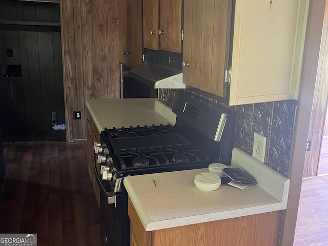 491 Cavender Creek Rd, Carrollton, GA 30116 - kitchen featuring gas stove, dark wood-type flooring, and light countertops
