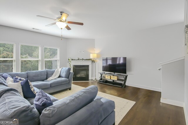 1720 Grant Ct, Braselton, GA 30517 - living area featuring a ceiling fan, wood finished floors, baseboards, and a fireplace with flush hearth