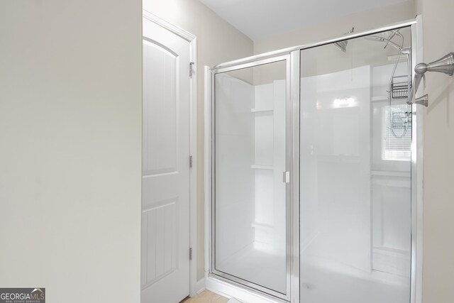 1720 Grant Ct, Braselton, GA 30517 - bathroom featuring a stall shower
