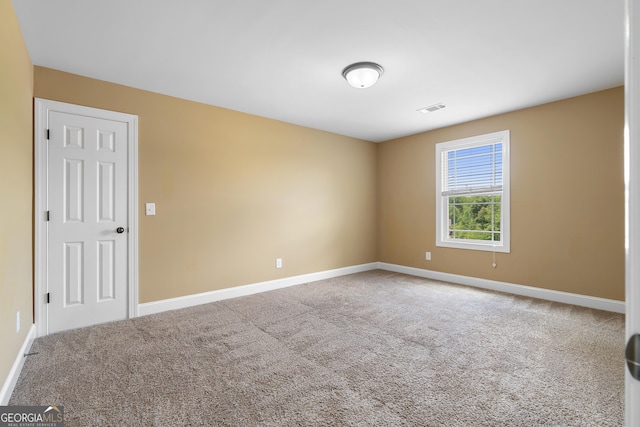 114 Brookstone Dr, Carrollton, GA 30116 - carpeted spare room featuring baseboards