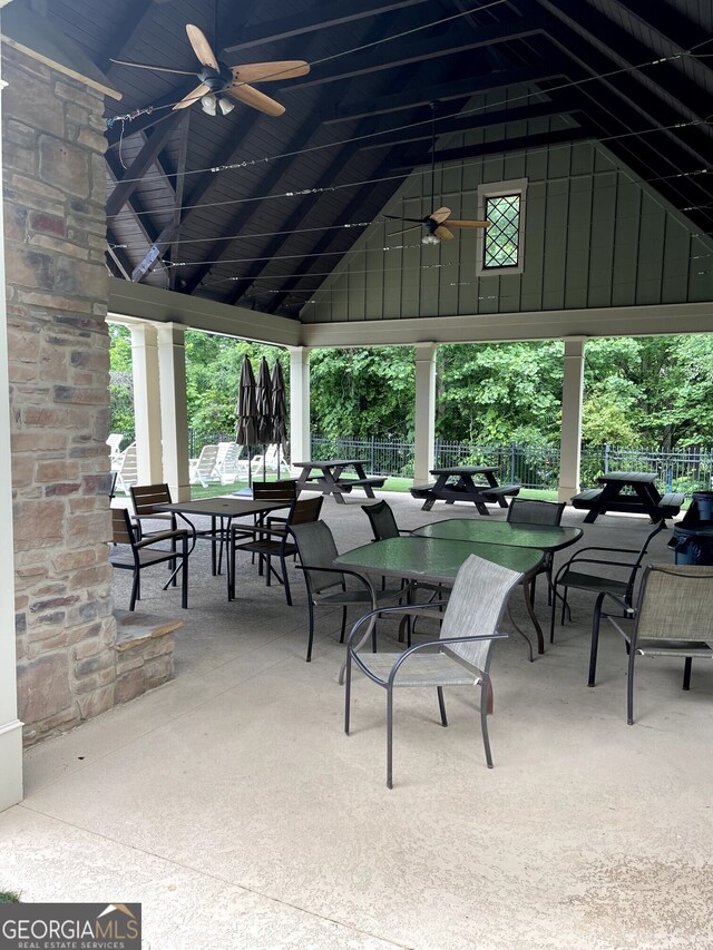 114 Brookstone Dr, Carrollton, GA 30116 - view of patio with ceiling fan, fence, and outdoor dining area