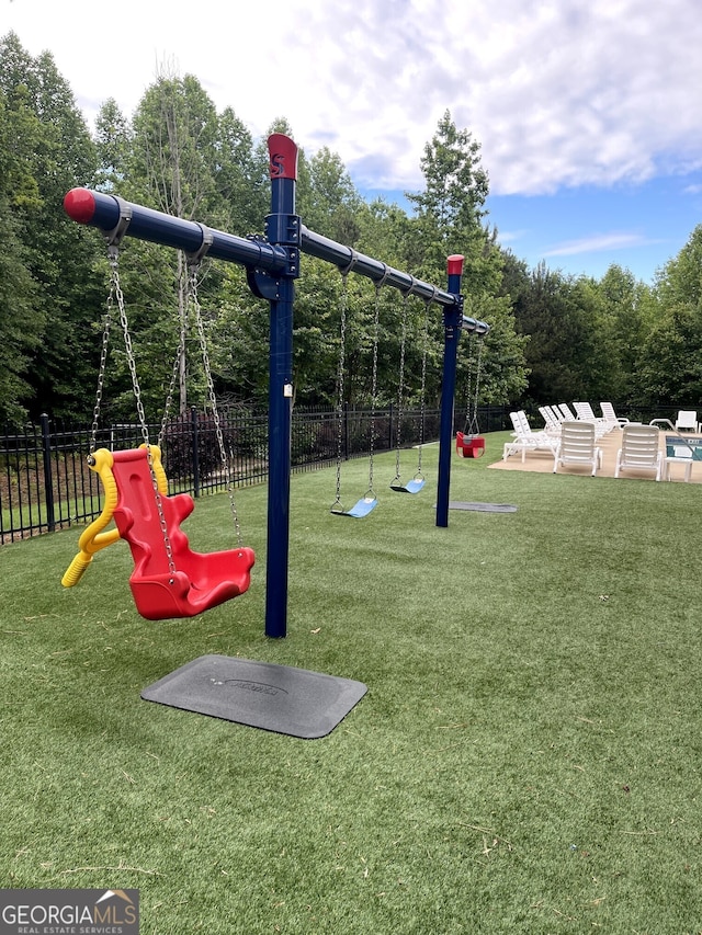 114 Brookstone Dr, Carrollton, GA 30116 - community jungle gym featuring view of wooded area