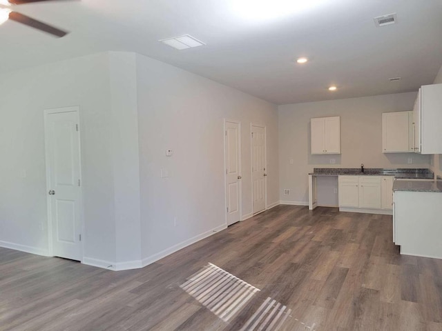 kitchen with recessed lighting, dark wood-style floors, baseboards, white cabinetry, and a ceiling fan