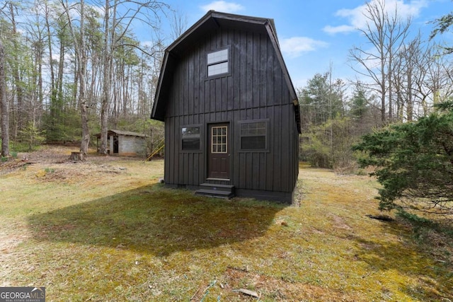 view of outbuilding featuring an outbuilding and entry steps