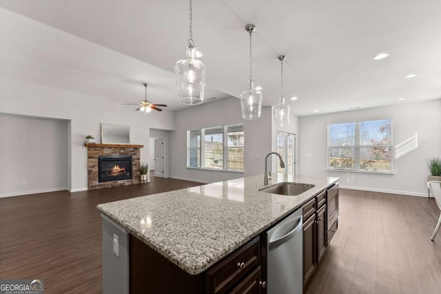 7995 Brewton Creek Dr, Cumming, GA 30028 - kitchen with a sink, stainless steel dishwasher, dark wood-style floors, healthy amount of natural light, and recessed lighting