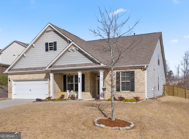 7995 Brewton Creek Dr, Cumming, GA 30028 - view of front facade with brick siding, covered porch, driveway, and an attached garage