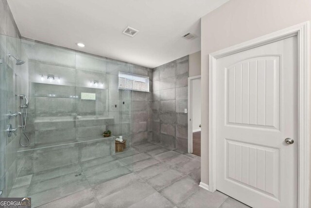 7995 Brewton Creek Dr, Cumming, GA 30028 - full bath featuring a tile shower and tile patterned flooring