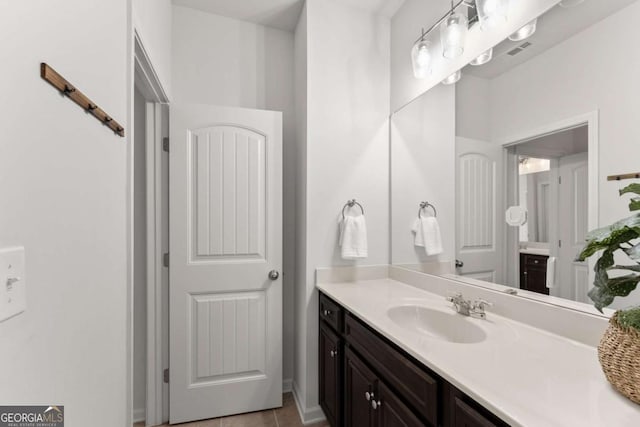 7995 Brewton Creek Dr, Cumming, GA 30028 - bathroom with vanity and tile patterned floors