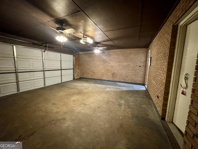 garage featuring a garage door opener and a ceiling fan