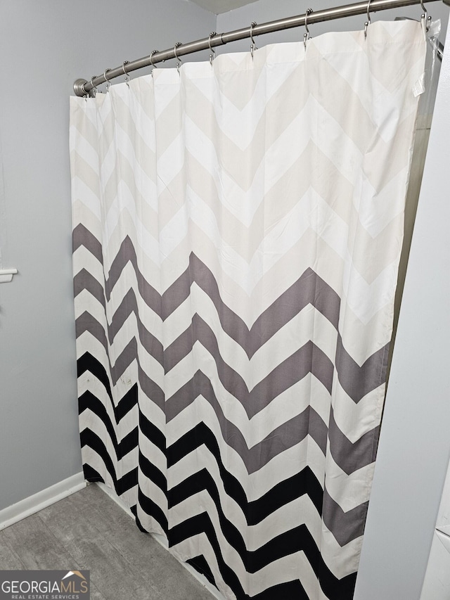 3978 Wc Hodges Rd, Statesboro, GA 30461 - full bathroom featuring baseboards