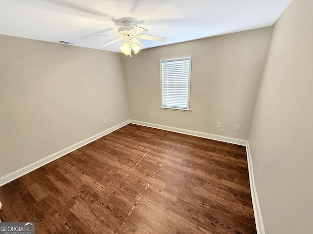 445 Logmont Trce, Athens, GA 30606 - spare room featuring wood finished floors, a ceiling fan, and baseboards