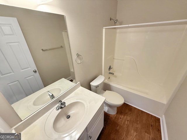 445 Logmont Trce, Athens, GA 30606 - full bathroom featuring wood finished floors, toilet, vanity, and shower / bathtub combination
