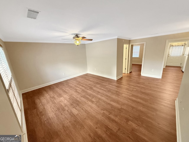 445 Logmont Trce, Athens, GA 30606 - unfurnished room with wood finished floors, crown molding, ceiling fan, and baseboards