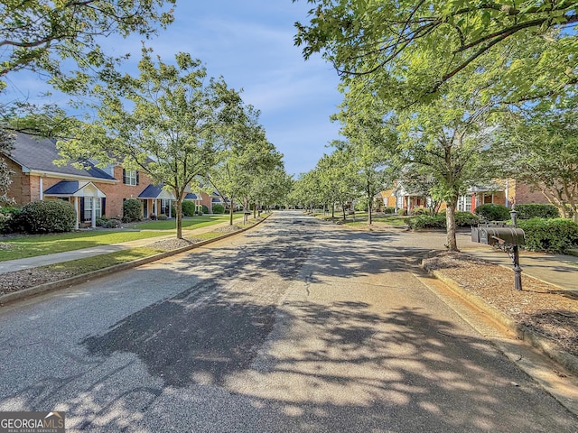 445 Logmont Trce, Athens, GA 30606 - view of asphalt street featuring curbs, sidewalks, and a residential view