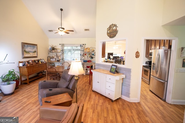4 E Moore St, Statesboro, GA 30458 - living area with a ceiling fan, high vaulted ceiling, and light wood finished floors