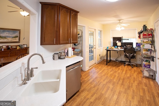 4 E Moore St, Statesboro, GA 30458 - kitchen with dishwasher, a sink, ceiling fan, an office area, and light wood-style flooring