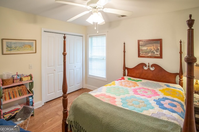 4 E Moore St, Statesboro, GA 30458 - bedroom with baseboards, wood finished floors, a ceiling fan, and a closet