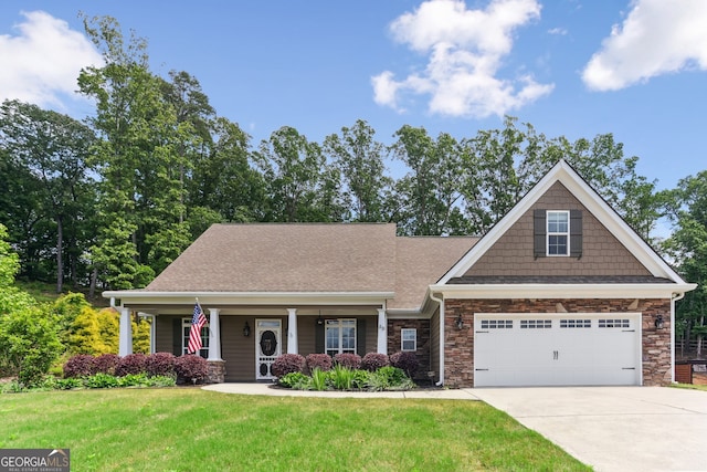 59 Grand Georgian Ct NE, Cartersville, GA 30121 - craftsman inspired home with driveway, a front lawn, a garage, covered porch, and a shingled roof
