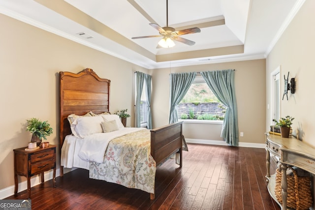 59 Grand Georgian Ct NE, Cartersville, GA 30121 - bedroom with a tray ceiling, dark wood-style flooring, ornamental molding, and ceiling fan