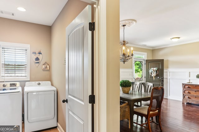 59 Grand Georgian Ct NE, Cartersville, GA 30121 - washroom with washer and dryer, a chandelier, wood finished floors, and crown molding