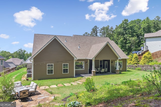 59 Grand Georgian Ct NE, Cartersville, GA 30121 - rear view of house featuring a patio area and a shingled roof