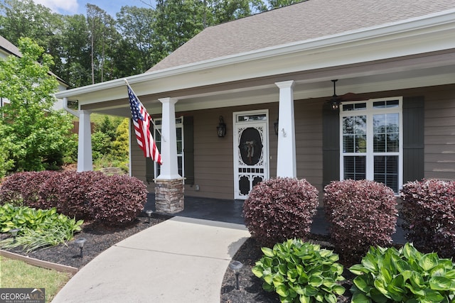 59 Grand Georgian Ct NE, Cartersville, GA 30121 - property entrance featuring covered porch and roof with shingles