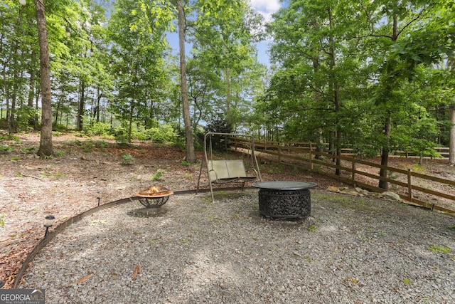 59 Grand Georgian Ct NE, Cartersville, GA 30121 - view of yard featuring an outdoor fire pit
