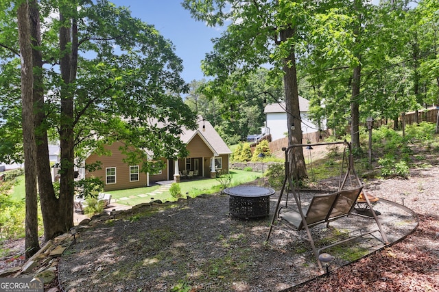 59 Grand Georgian Ct NE, Cartersville, GA 30121 - view of yard featuring a fire pit