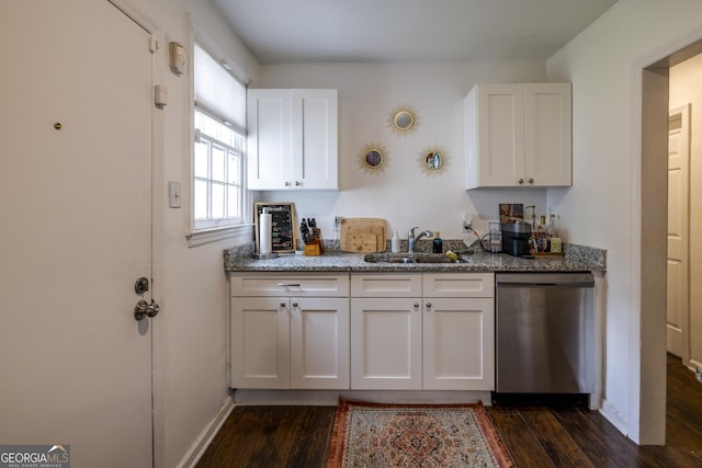 6 Oleander Ave, Savannah, GA 31404 - kitchen with dishwasher, a sink, dark wood-style floors, white cabinets, and stone countertops