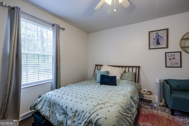 6 Oleander Ave, Savannah, GA 31404 - bedroom featuring multiple windows, a ceiling fan, wood finished floors, and baseboards