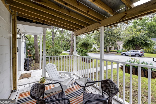6 Oleander Ave, Savannah, GA 31404 - wooden deck with covered porch