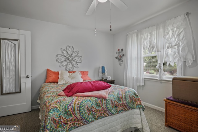 bedroom with carpet flooring, baseboards, and ceiling fan