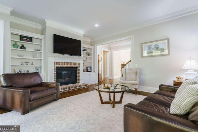 living room with ornamental molding, baseboards, a brick fireplace, wood finished floors, and recessed lighting