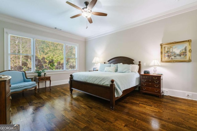 bedroom with ornamental molding, baseboards, wood finished floors, and a ceiling fan