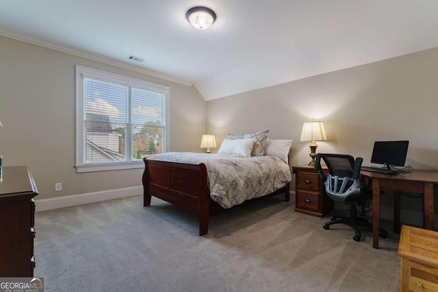 bedroom featuring carpet flooring, crown molding, baseboards, an office area, and lofted ceiling
