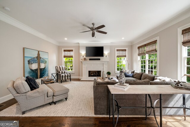 1849 Rock Springs Ln NE, Atlanta, GA 30324 - living room with ornamental molding, ceiling fan, baseboards, a fireplace with flush hearth, and recessed lighting