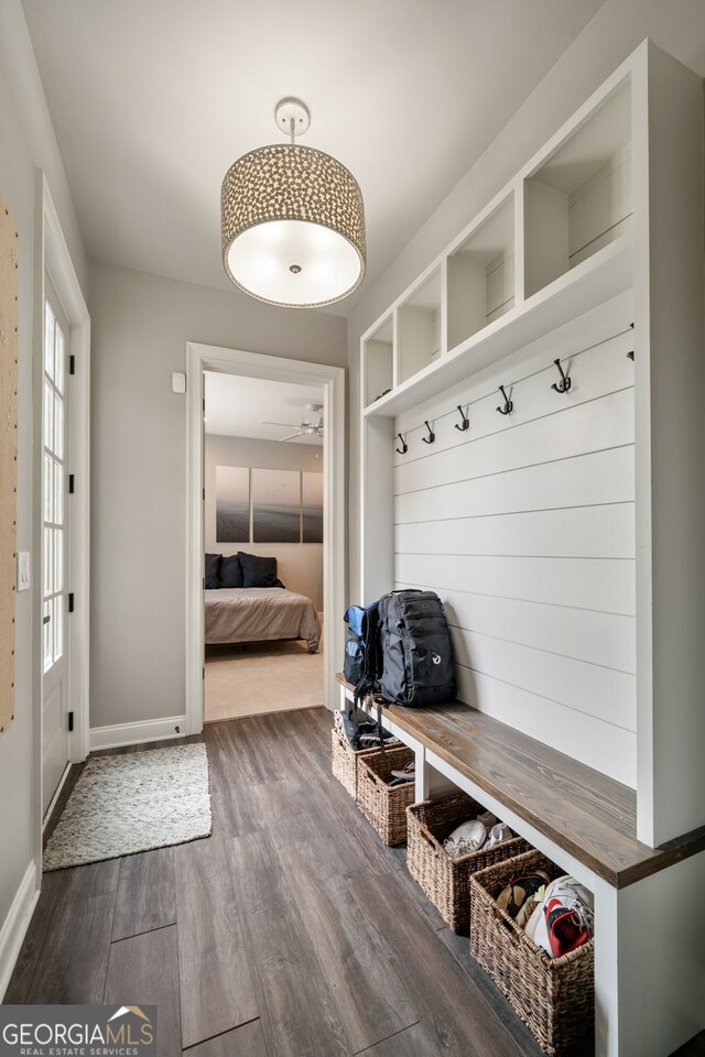 1849 Rock Springs Ln NE, Atlanta, GA 30324 - mudroom with dark wood finished floors, baseboards, and a ceiling fan