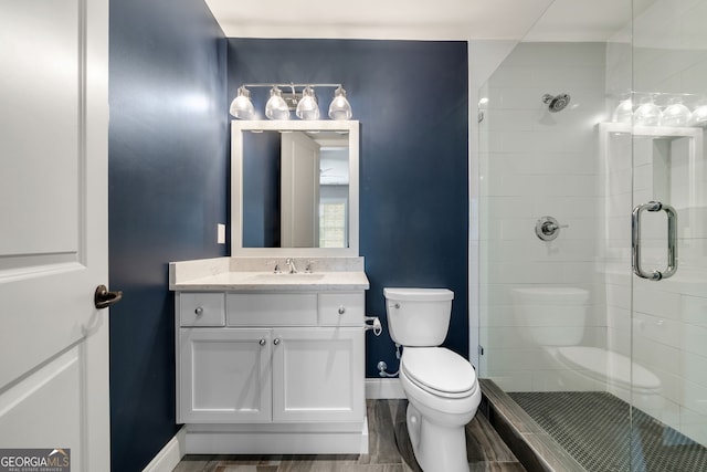 1849 Rock Springs Ln NE, Atlanta, GA 30324 - bathroom with toilet, baseboards, and a shower stall