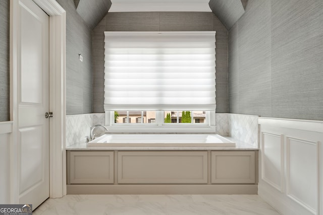 1849 Rock Springs Ln NE, Atlanta, GA 30324 - full bath with marble finish flooring, a garden tub, wallpapered walls, and wainscoting