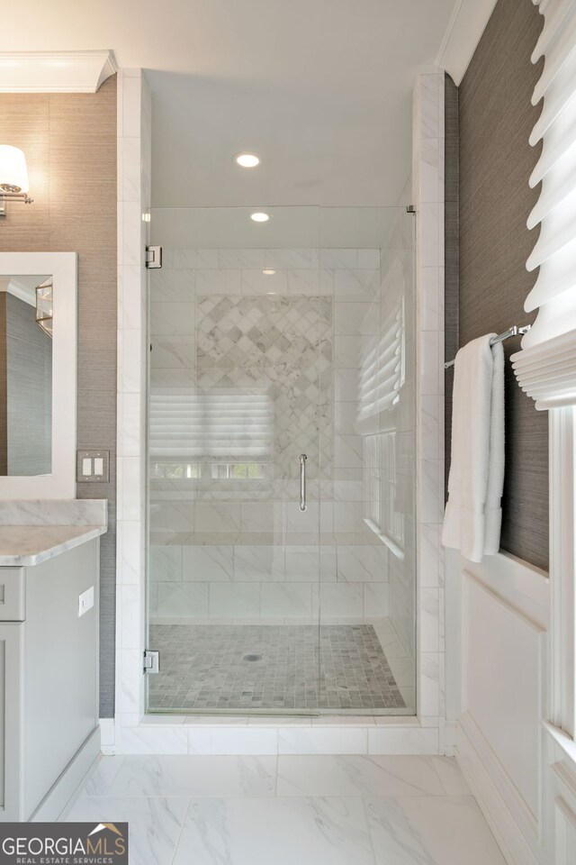 1849 Rock Springs Ln NE, Atlanta, GA 30324 - bathroom with marble look tiles, recessed lighting, vanity, and a stall shower
